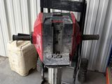 une petite machine qui se trouve dans le garage