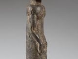 an image of a statue of a woman with a hat on her head