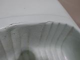 a close up view of a toilet with the seat up