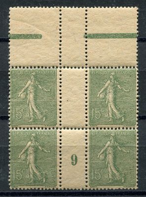 a stamp with four different images of a woman on it