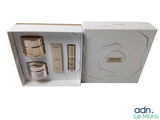 a white box containing a set of skin care products