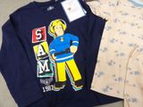a blue shirt with a picture of a fireman on it
