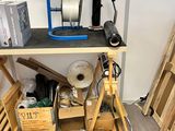 a table with a lot of boxes and a machine on it