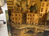 an old picture of a building with a bridge in front of it