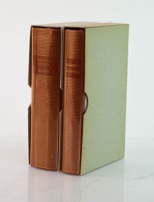 two books that are sitting next to each other on a table