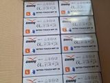 a box full of batteries sitting on top of a table