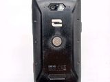 an image of a cell phone with a button on it