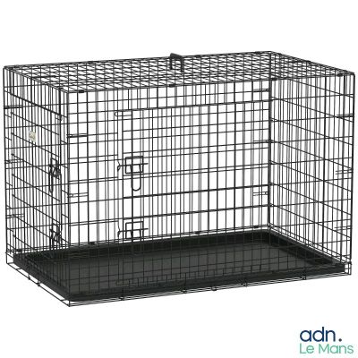 a black metal dog cage with a door open