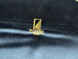 a black case with a yellow logo on it