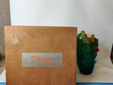 a brown box with a name on it sitting on a table