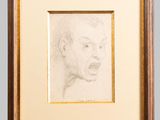 a pencil drawing of a woman ' s face in a wooden frame