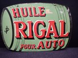 une photo d'un panneau indiquant « huile rigal pour auto »