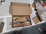 a cardboard box that has some tools inside of it