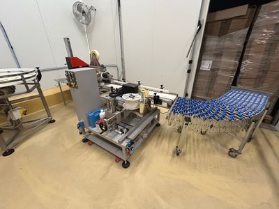 a machine that is sitting on a cart in a room