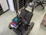 a machine that is sitting on the floor in the room