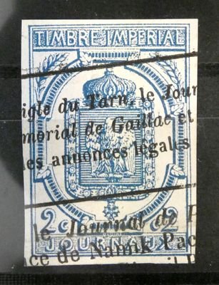 un vieux timbre sur lequel figure un blason