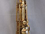 an image of a saxophone that is sitting on top of a table