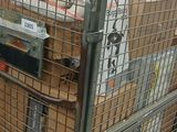 a metal cart with a lot of items in it
