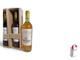 two bottles of wine in a wooden box on a white background