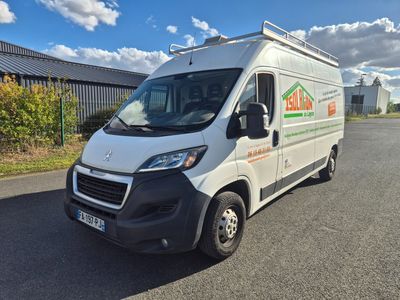 a white van that is parked on the side of the road