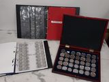 a lot of silver coins in a case on the counter