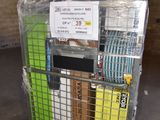 a metal cage with a bunch of books in it