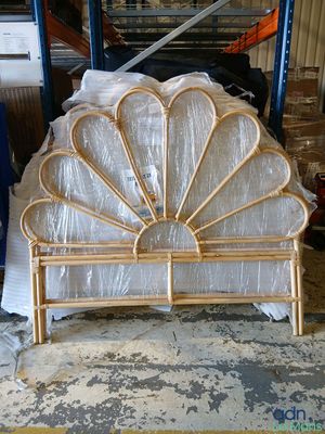 a bed that has been wrapped up and ready to be shipped