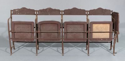 Rang de 4 sièges de cinéma en bois repercé armature métalliq…