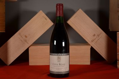 a bottle of wine that is sitting on a table