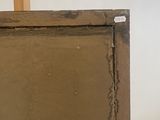 painting on easel in front of a mirror in a room with a white wall