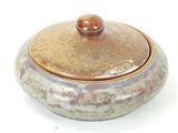an image of a ceramic container with a wooden lid