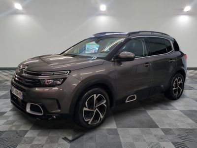 the new citrole suv is parked in a showroom