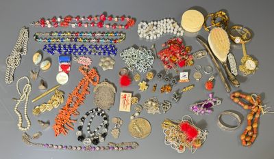 many different types of jewelry on the table