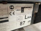 a label on the back of a machine that is sitting on a table