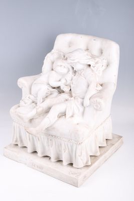 an image of a statue of a woman sitting on a chair