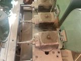 a picture of a machine that is working on a piece of wood
