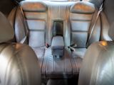 a picture of a car seat in the back of a car
