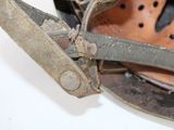 a close up of a baseball helmet with a glove on it