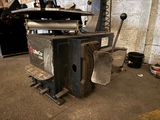 a stove that is sitting in a garage