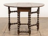 an image of a table with a wooden top on a wooden floor