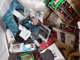 a pile of clothing and other items in a plastic bag