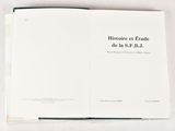 an open book with a black and white title on it