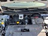 the engine of a car with its hood open and the hood open
