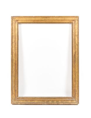 a gold frame on a white wall with a white background
