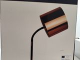 packaging for the home decor lamp on display in a store