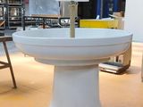 an image of a white pedestal sink in a room