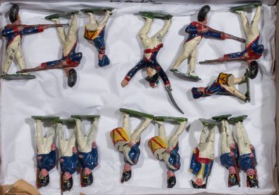 six figurines of a man on a snowboard in a box