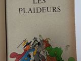 un livre ouvert sur lequel figure l'image d'un groupe de personnages de dessins animés