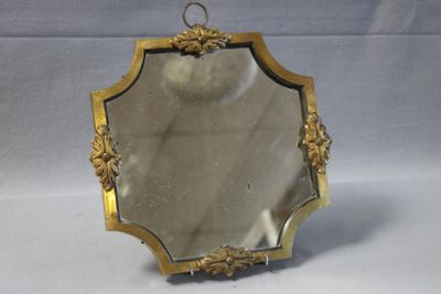 a mirror that is sitting on a table