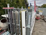 a pile of metal and other items in a yard